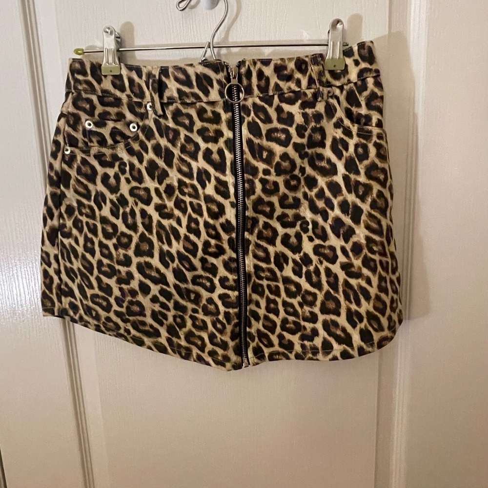 Leopard print mini skirt.